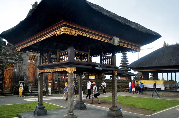 BALI, INDONESIA - MARCH 24 : Travelers people travel visit and respect praying Shaivite Shiva temple Pura Ulun Danu Bratan or Pura Bratan in Lake Bratan at Bedugul on March 24, 2018 in Bali, Indonesia