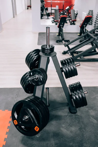 Weight lifting equipments in a club gym. — Stock Photo, Image