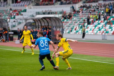MINSK, BELARUS - MAY 24, 2020:  The Belarusian Cup Final 2020. Football match between FC BATE Borisov VS FC Dynamo Brest in Dinamo Stadium (Minsk) clipart