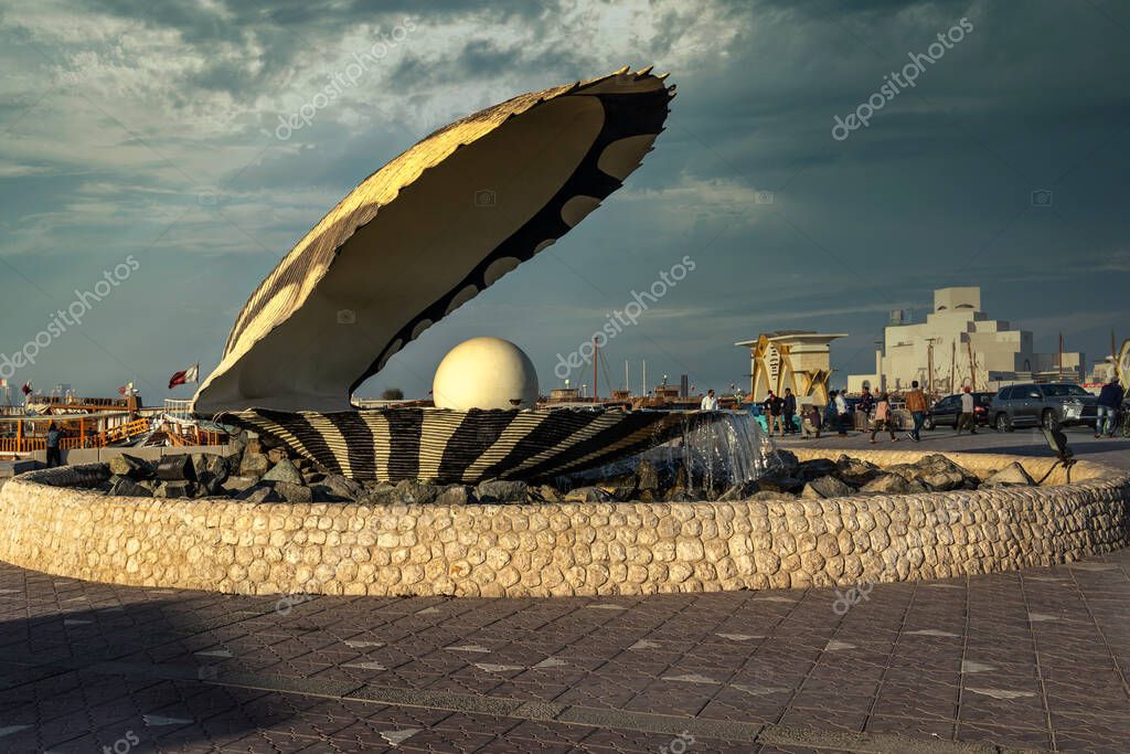 The pearl monument in Doha cor niche  daylight view with Doha skyline in background