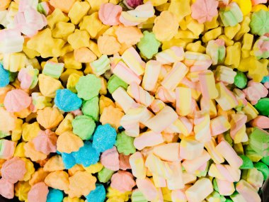 Karışık reçelin soyut arkaplanı. Bir sürü renkli çiğneme şekeri, üst görünüm.