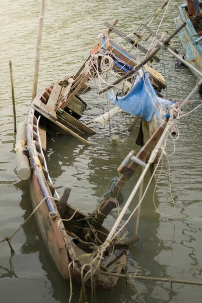 Sinking boat on the sea.