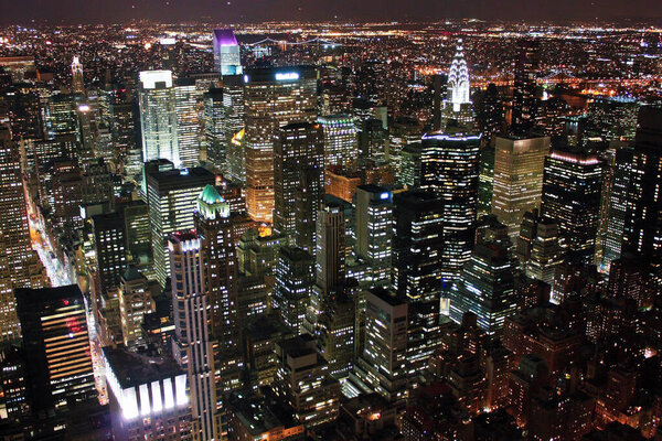 New York City at the night lights from Empire State Building aerial view, night scene of famous place of American United States, must see in US, traveling in american cities, worlds bussiness and financial centre