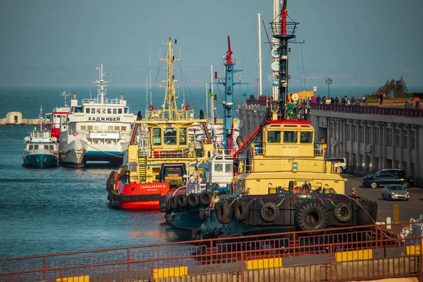 Two port tugs on the dock in the port - Ukraine, Odessa, 17,10,2019 — Stock Photo, Image