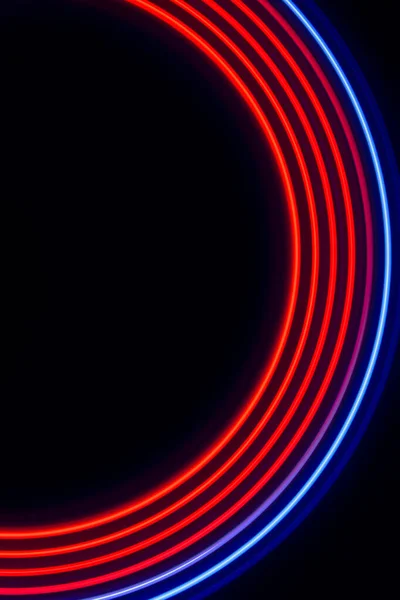 red-blue light circles on a black background