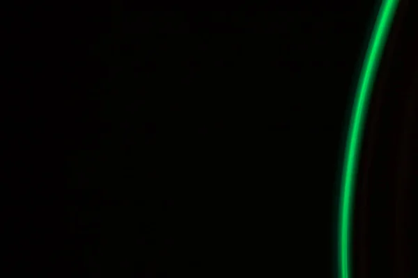 green  light lines on a black background