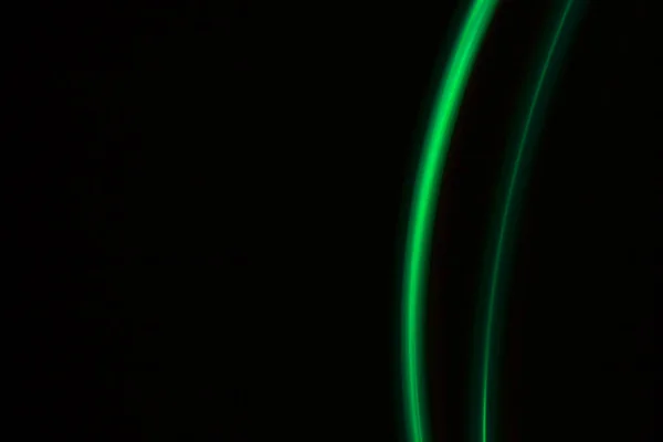 Grüne Lichtlinien Auf Schwarzem Hintergrund — Stockfoto