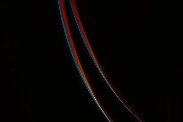 Mehrfarbige Lichtlinien Auf Schwarzem Hintergrund — Stockfoto