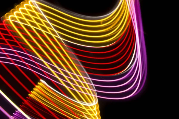 Yellow Red Pink Light Curve Lines Black Background – stockfoto