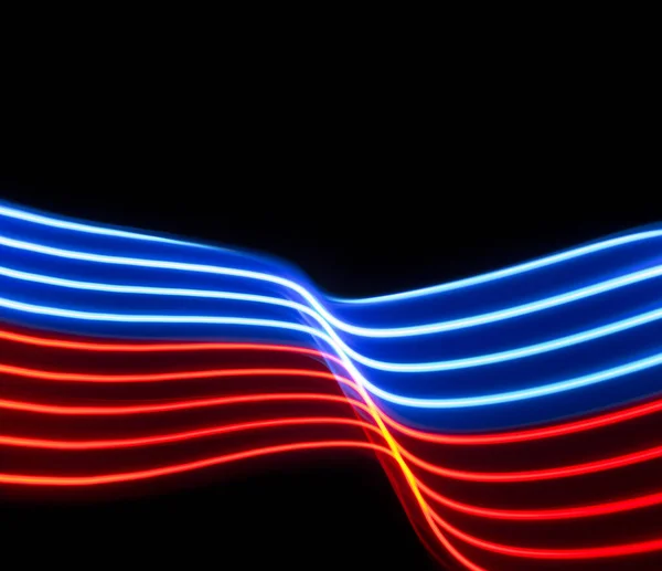 Rote Und Blaue Lichtdynamiklinien Auf Schwarzem Hintergrund lizenzfreie Stockfotos
