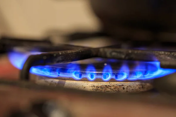 Old gas burner, blue gas flame