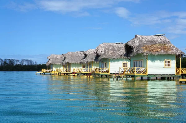 Thatched cabins over the sea