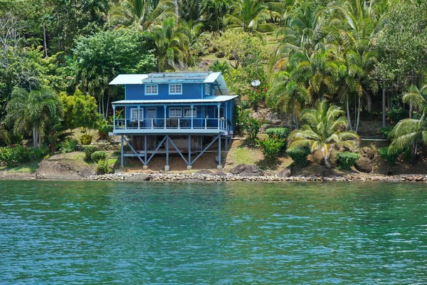 Off grid coastal home with lush vegetation