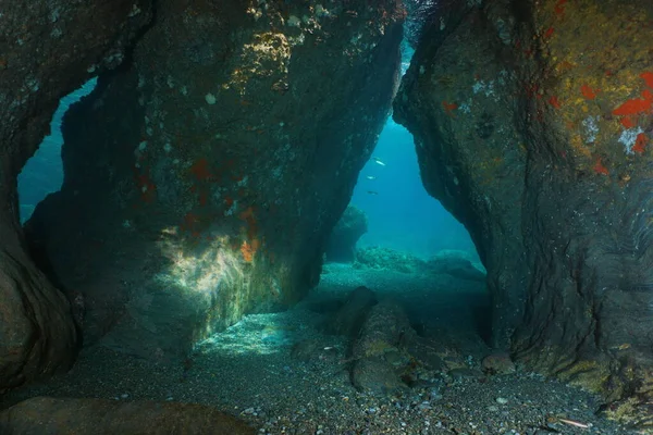 Passage between rocks underwater Mediterranean sea