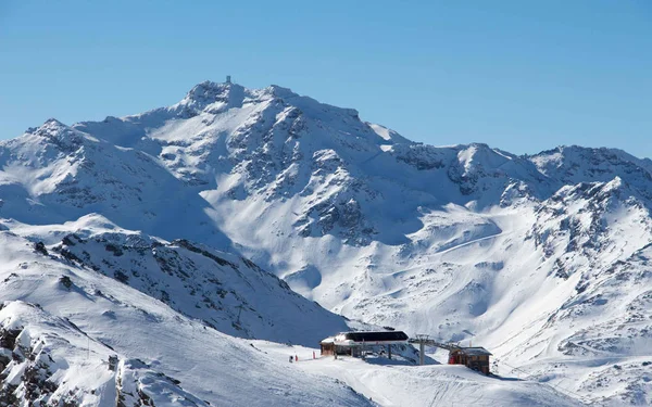 Col de thorens peclet val thorens gôndola cabine vista pôr do sol nevado montanha paisagem França alpes — Fotografia de Stock