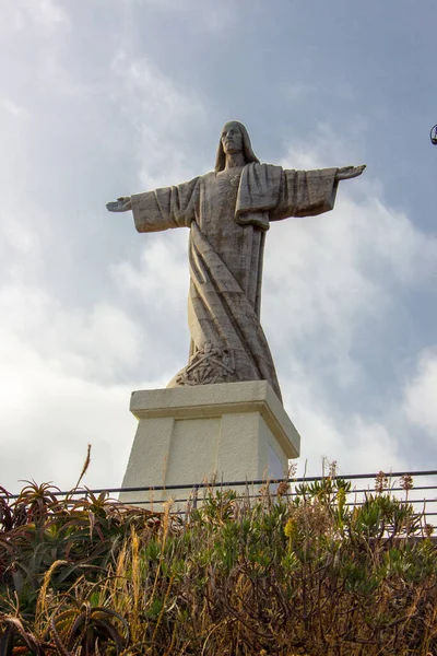 The Christ the King statue on Madeira island, Jesus Christ statue, Madeira, Garajau, Portugal, smaller than the original in Rio de Janeiro, but also very spectacular, watching over the sea.