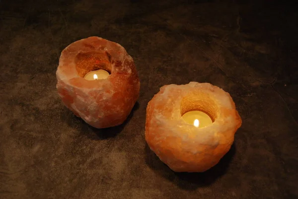 Two Himalayan Salt Lamp Candles Dark Setting — Stock Photo, Image