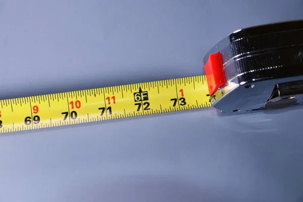 Social Distancing Feet Shows Tape Measure Stock Photo