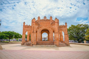 Panoramic view of the main square of the downtown center in Chiapa de Corzo, sunny day and cloudy sky clipart