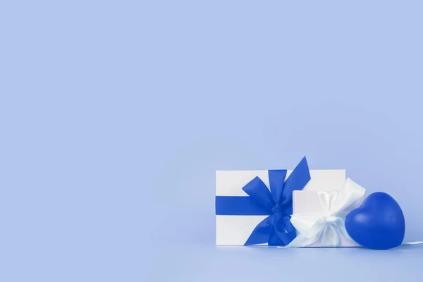 Happy Womens day template design in trendy classic blue color. Decorative gift box with blue bow on blue background. — 스톡 사진