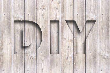 Ahşap tezgahta ahşap yazı tipi. Kendin yap konsept. 3d illüstrasyon.