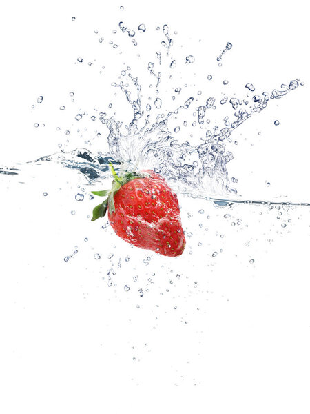 Strawberry Water splash over white background