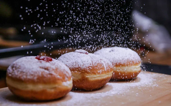 Hanukkah food doughnuts with jelly and sugar powder with bookeh background. Jewish holiday Hanukkah concept and background. Copy space for text. Shallow DOF — Stock Photo, Image