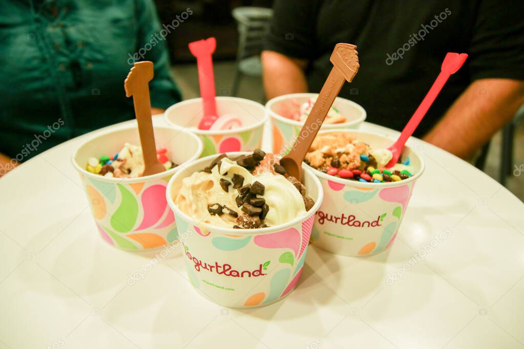 Dallas, Texas - June 19, 2017: Frozen yogurt in cups. Yogurtland is an international franchise chain of frozen yogurt stores with self serve format and inexpensive products.