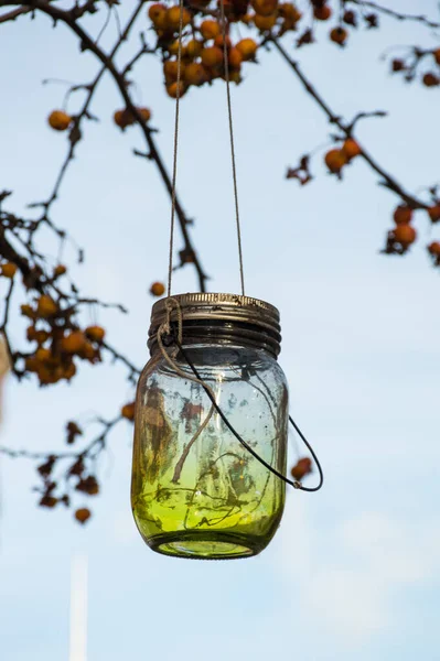 decorative jar street lamp on tree