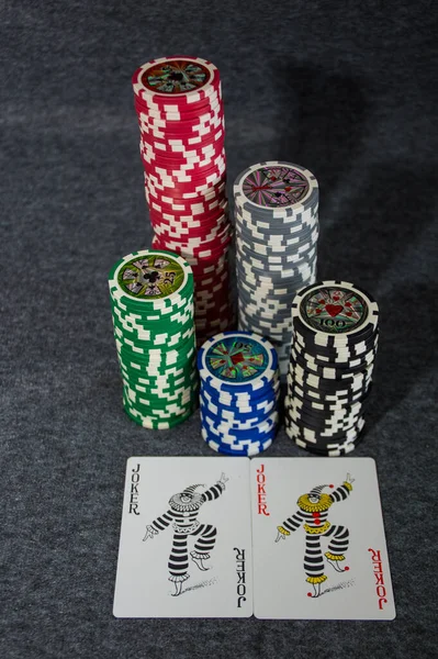 poker chips and joker cards