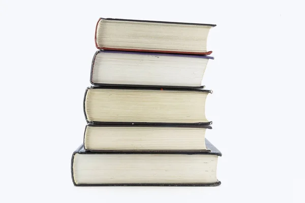 白い背景の上に横たわる本のスタック — ストック写真