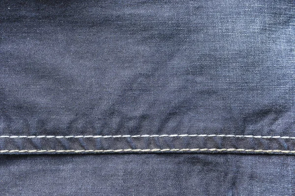 Texture of blue denim pants — Stock Photo, Image