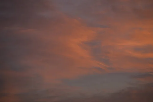 Texture of orange clouds at sunrise — Stock Photo, Image