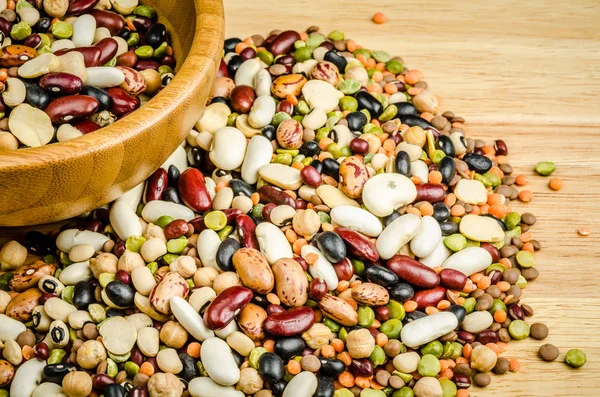 Legumes on wood, closeup, background — Stock Photo, Image