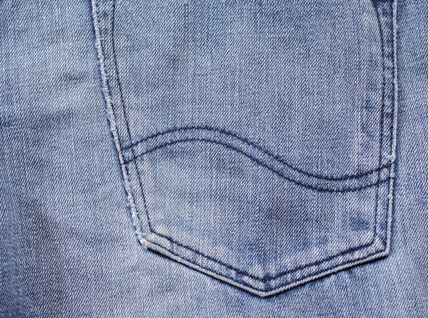 Texture of blue jeans back pocket background — Stock Photo, Image