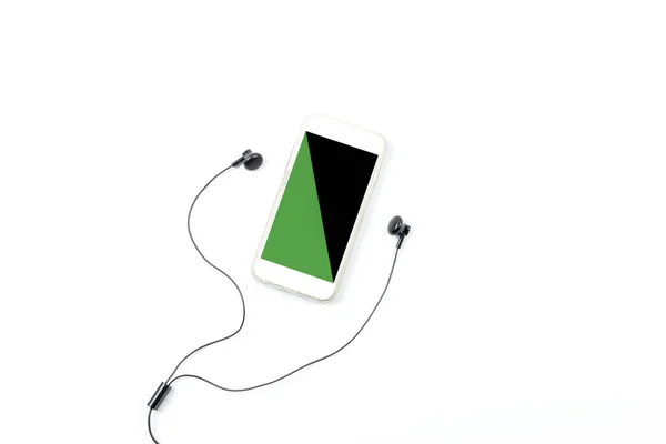 Black and green color on smart phone screen and earphones — Stock Photo, Image