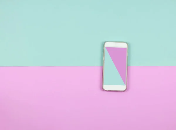 Blue and pink color on smart phone screen on colored background. — Stock Photo, Image