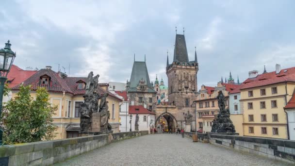 People walking on Charles bridge in Prague — Stock video