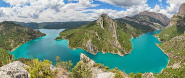 Panorama of Canelles reservoir, Lleida province, Spain clipart