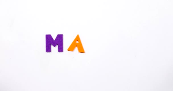 The word mama is written in dancing letters. — Stock Video