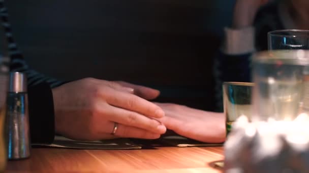 Close-up of the hands of LGBT partners. — Stock Video