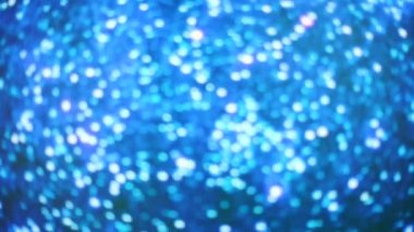 Şenlikli arka plan mavi yıldızlar yukarı aşağı hareket eder.