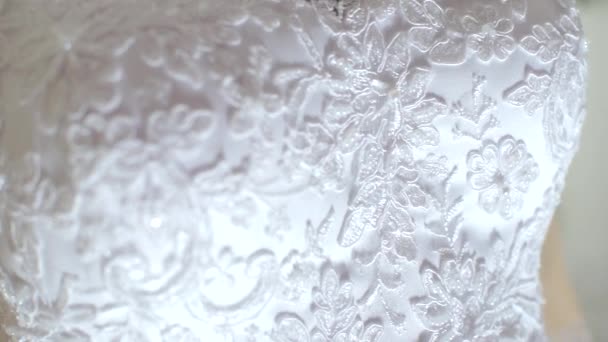 Lace fabric on a brides wedding dress — Stock Video