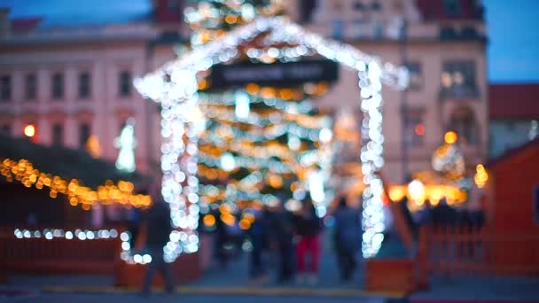 Fundo de Natal. Luzes do mercado de Natal no efeito bokeh . — Vídeo de Stock