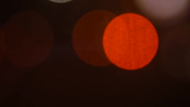 Hintergrund aus Bokeh-Effekt Nahaufnahme von Straßenlampen in der Nacht. — Stockvideo