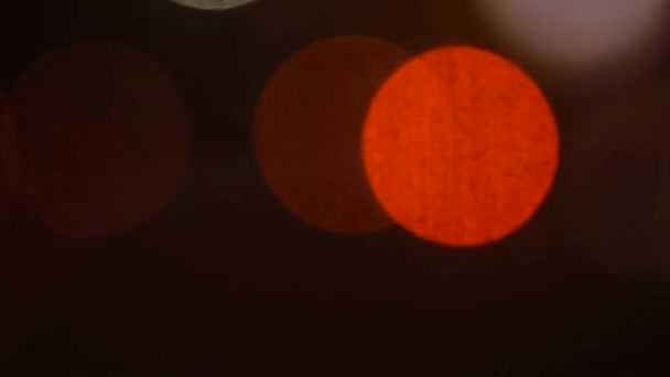 Sfondo fatto di effetto bokeh primo piano di lampadine stradali di notte . — Video Stock