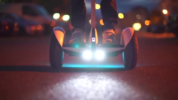 Close-up of a hoverboard that leaves into the distance in the evening — 비디오