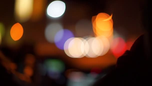 Fondo hecho del movimiento de manchas de luz en el efecto bokeh . — Vídeos de Stock