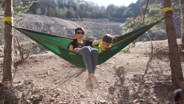 Mother with son in a hammock — 비디오