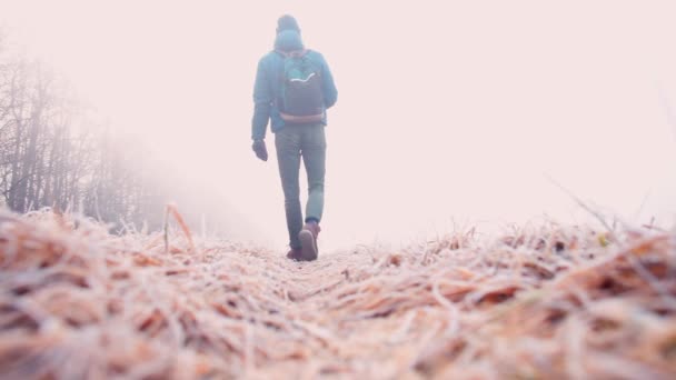 A lonely man backs away with a smartphone in his hands — Stock Video